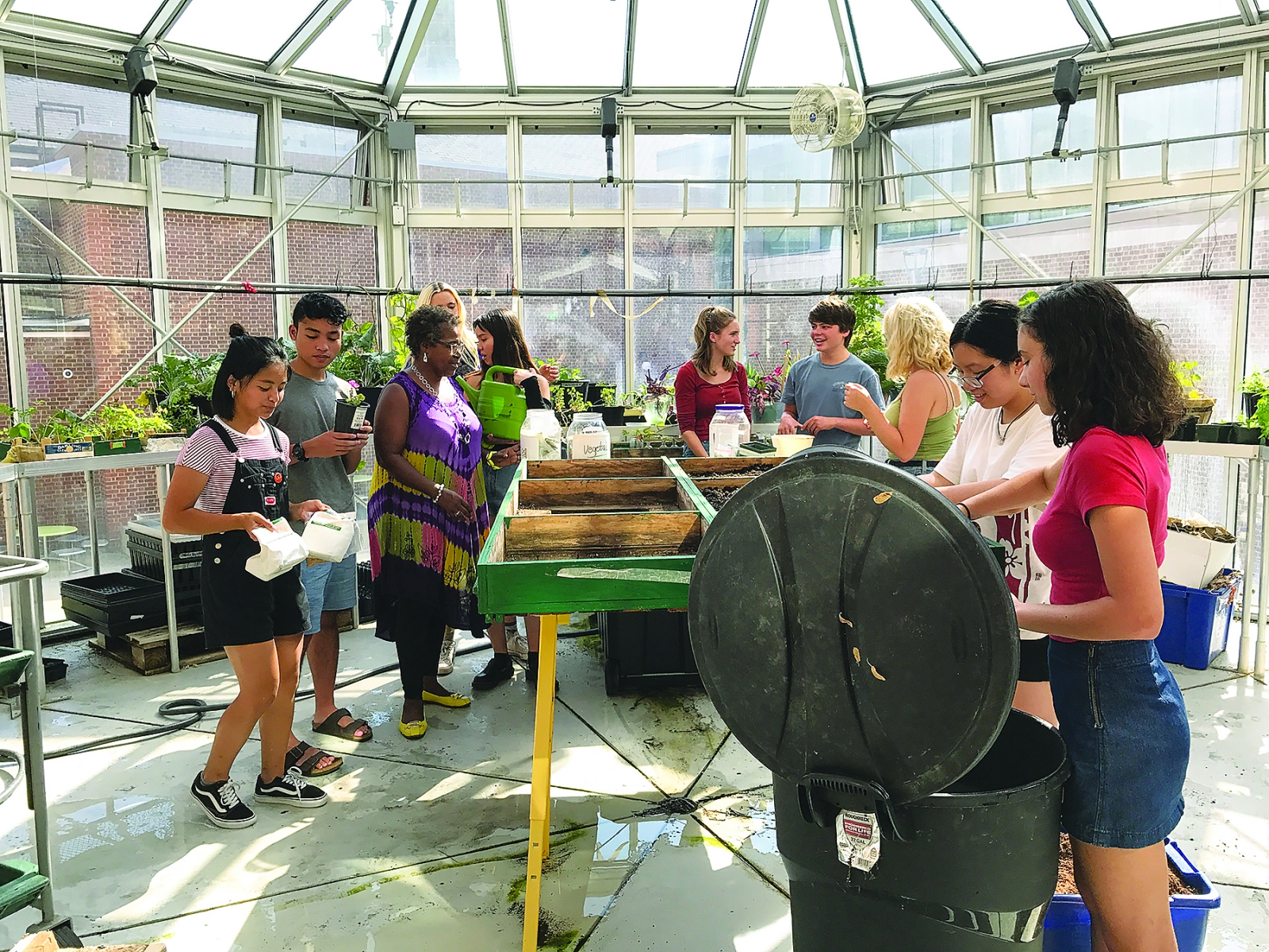 Students work in the greenhouse at Wilson High School